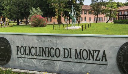 Policlinico di Monza sign, grounds and hospital building