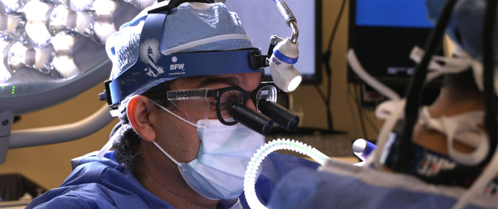 Surgeon in the operating room on the UHN minimally invasive cardiac surgery programme page